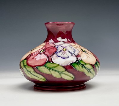 Lot 1040 - A Moorcroft 'Pansy' pattern vase, designed by...