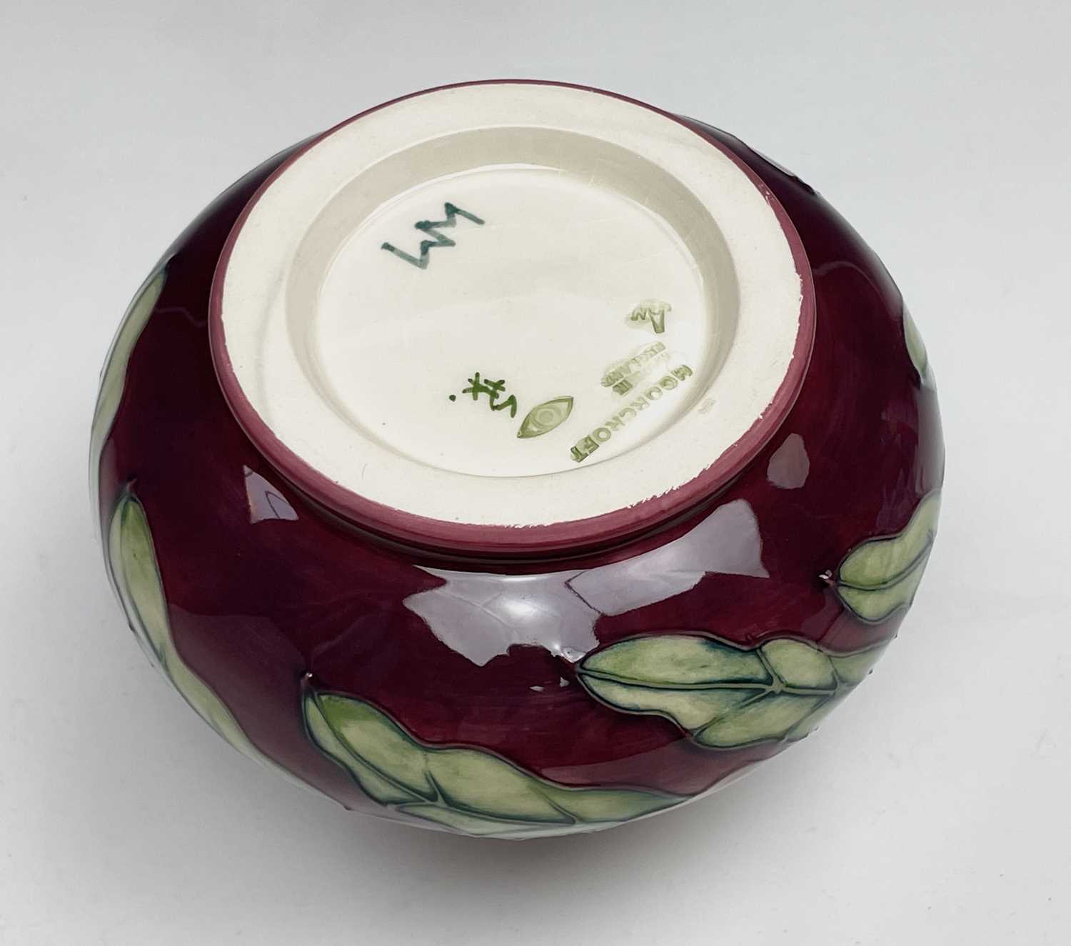 Lot 1040 A Moorcroft 'Pansy' pattern vase, designed