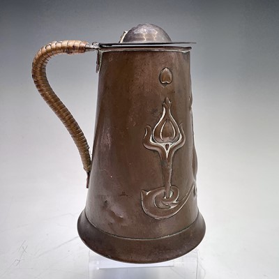 Lot 50 - An Arts and Crafts copper lidded jug, by...