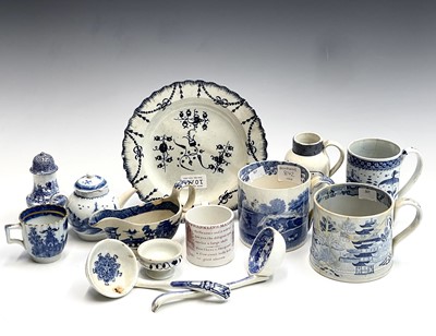 Lot 869 - A collection of English blue and white pottery,...