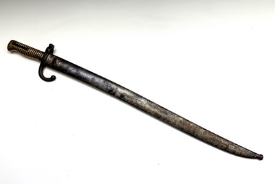 Lot 291 - A French 1874 pattern bayonet, with brass grip,...