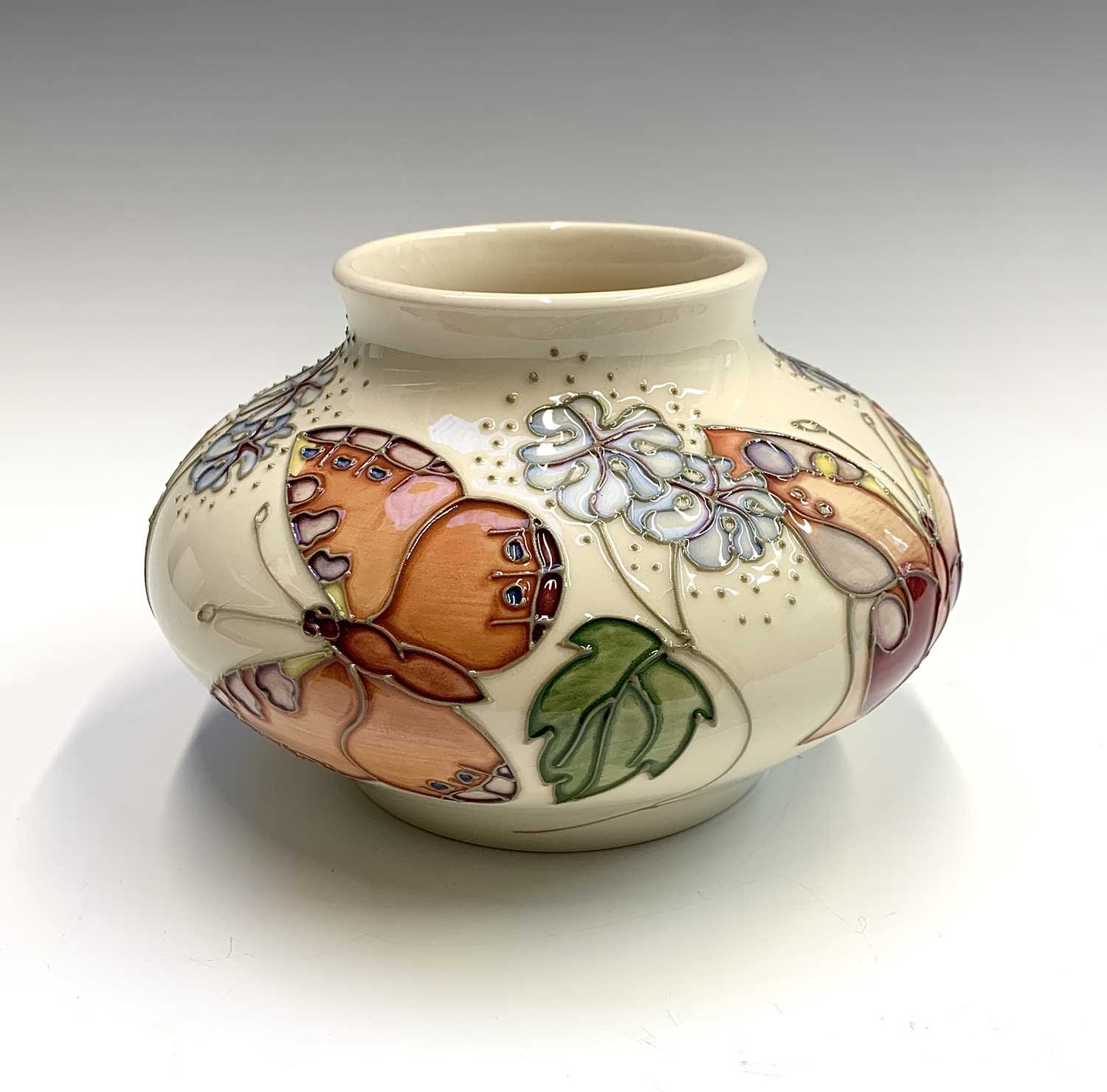 Lot 821 - A Moorcroft 'Butterfly' pattern squat vase,...