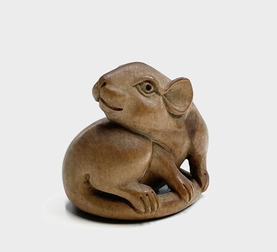 Lot 229 - A Japanese carved wood netsuke in the form of...