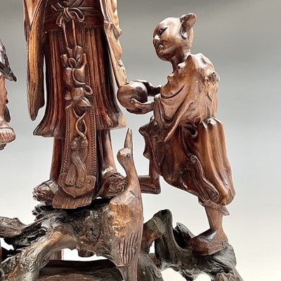 Lot 29 - A Chinese root carving of three figures and a...