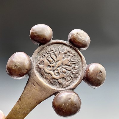Lot 54 - A Buddhist bronze rattle, length 23.5cm, width...