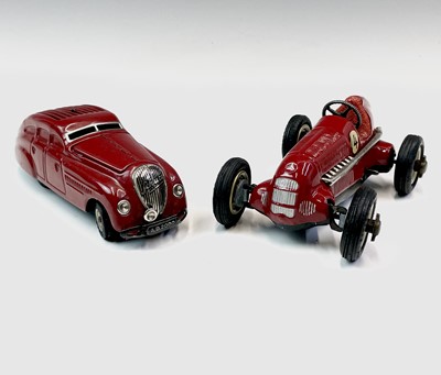 Lot 600 - Schuco Cars - 2 cars. A red Kommando Anno 2000...