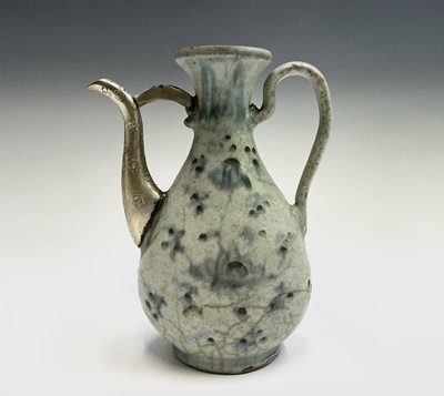 Lot 69 - A Chinese blue and white ewer, Ming Dynasty,...