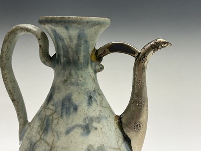 Lot 69 - A Chinese blue and white ewer, Ming Dynasty,...