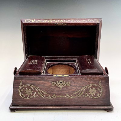 Lot 23 - A Regency rosewood and cut brass inlaid tea...