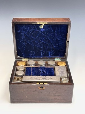 Lot 76 - A Victorian rosewood travelling vanity box,...