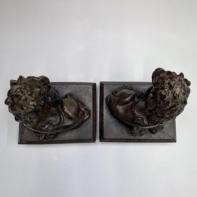 Lot 80 - A pair of 20th century bronzed composition...