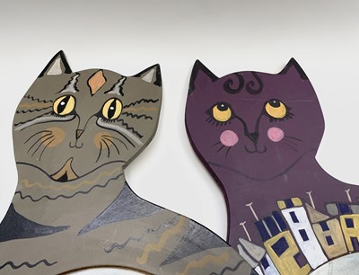 Lot 1004 - PONKLE (1934-2012) Two painted wooden cats...