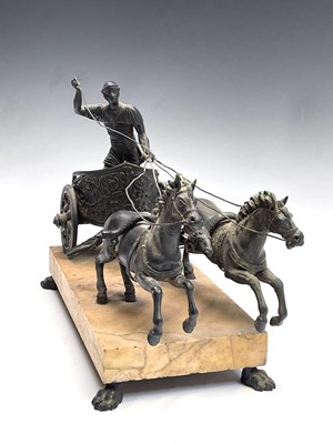 Lot 88 - An Italian bronze group of a chariot racer and...