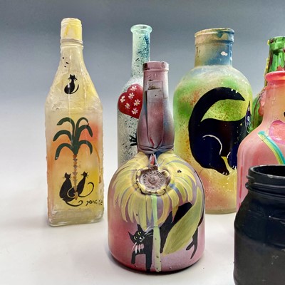 Lot 1017 - PONKLE (1934-2012) 10 painted bottles and jars