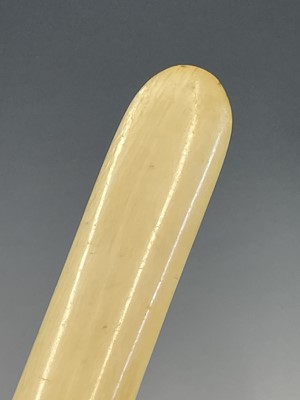Lot 63 - An ivory and silver mounted paper knife...