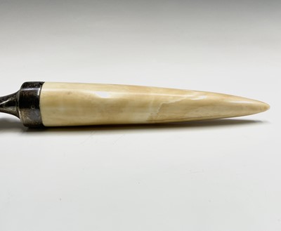 Lot 63 - An ivory and silver mounted paper knife...