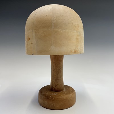 Lot 145 - A 20th century milliner's wooden hat block....