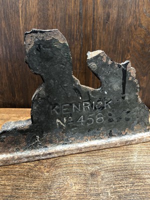 Lot 9 - A 19th-century cast iron Kenrick sphinx door...