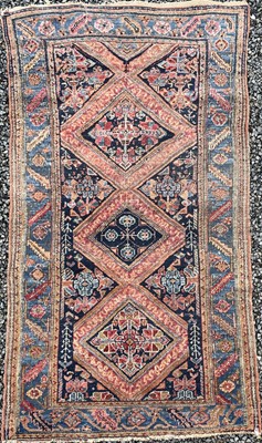 Lot 1203 - A Hamadan rug, North West Persia, an indigo...