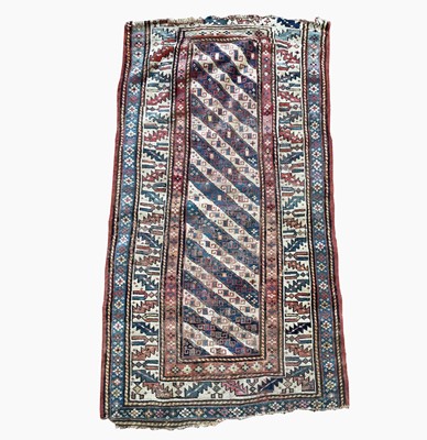 Lot 1204 - A Caucasian long rug, late 19th century, the...