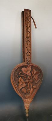 Lot 88 - Antique carved wooden bellows.   Length: 75cm.