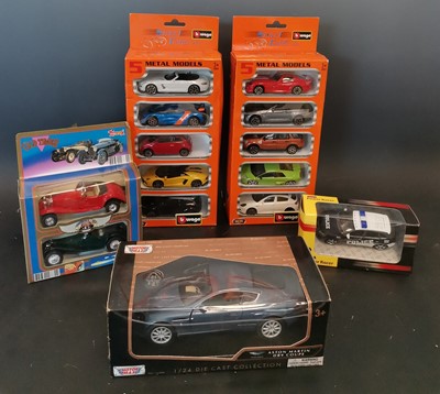 Lot 89 - A collection of die-cast toy cars inlcuding...