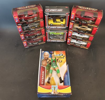 Lot 90 - A collection of boxed die-cast toy cars and a...