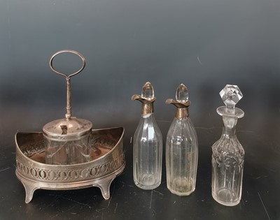 Lot 7 - A George III silver cruet stand with various...