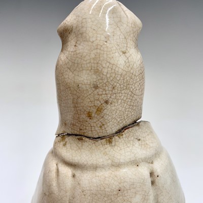 Lot 38 - A Chinese blanc de chine model of a dog of fo,...