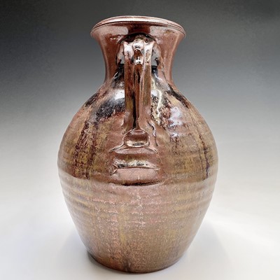 Lot 920 - A large studio pottery brown glazed jug,...