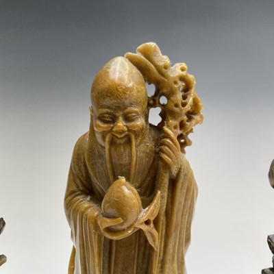 Lot 24 - A Chinese soapstone figure of Shou Lao, early...