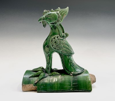 Lot 177 - A Chinese green glazed ridge tile, height 27cm,...