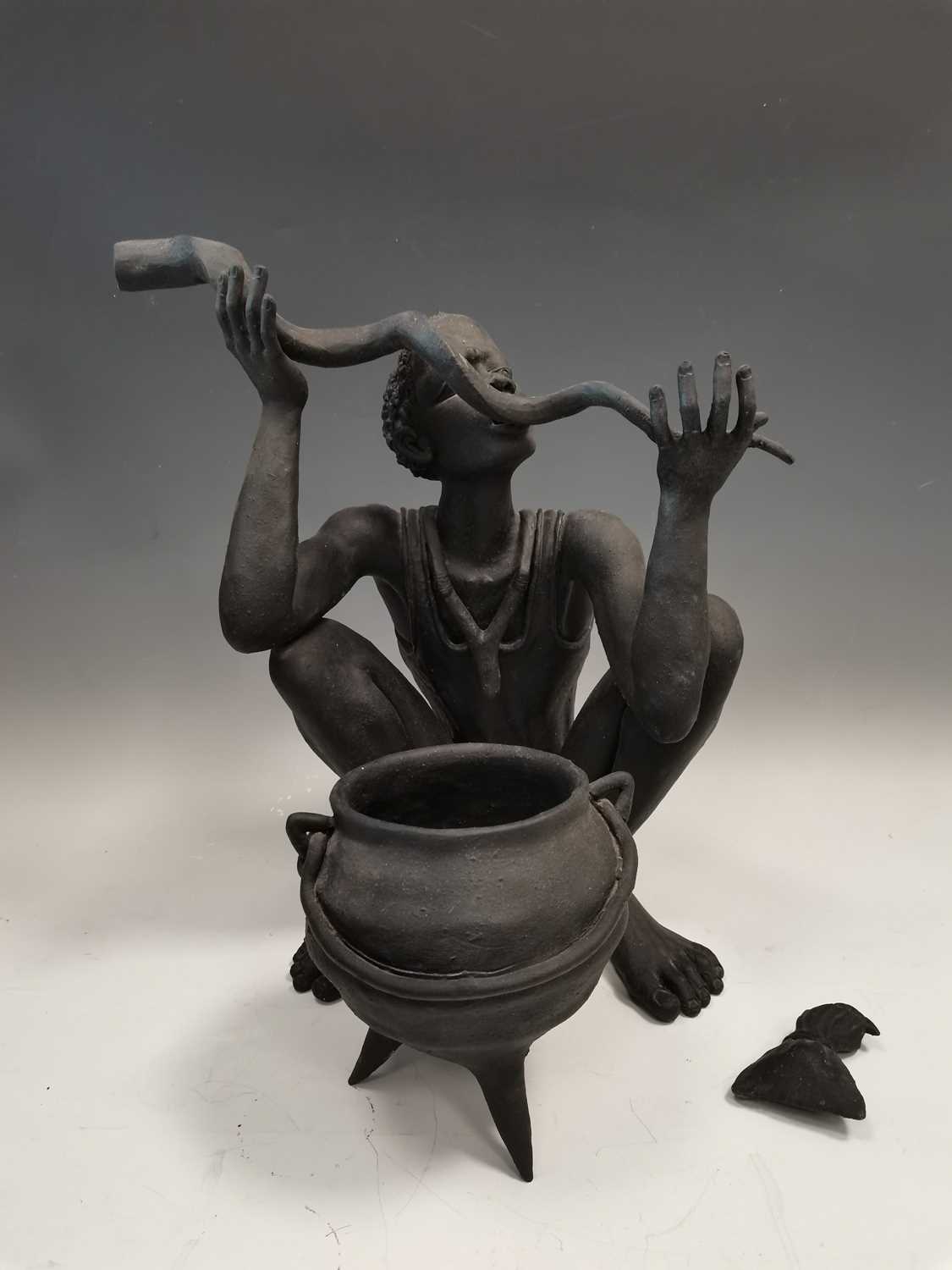 Lot 10 - Fired clay figures made in Zimbabwe including...