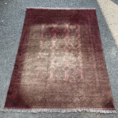 Lot 26 - An Afghan carpet, 350 x 254cm.