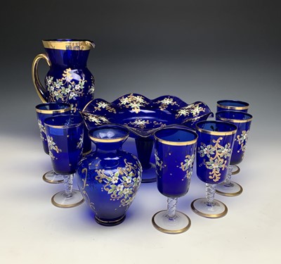 Lot 1113 - A Murano blue glass water set, the jug and six...