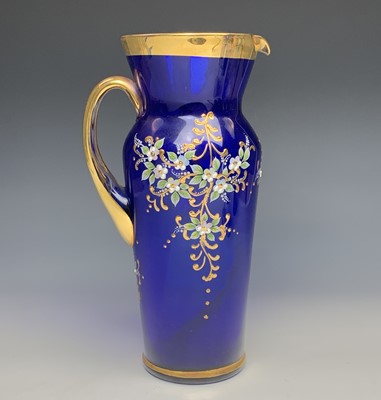 Lot 1113 - A Murano blue glass water set, the jug and six...