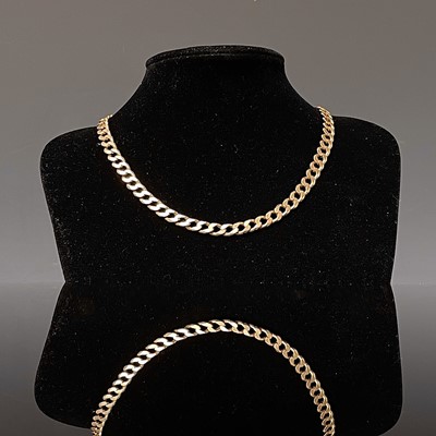 Lot 268 - A 9ct gold curb link necklace 70cm 54.6gm