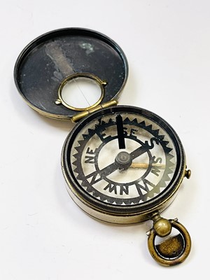 Lot 419 - A 19th brass marching compass, 'The Skeleton',...