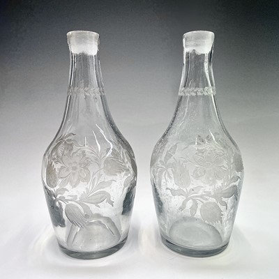 Lot 927 - A pair of George III blown glass decanters,...