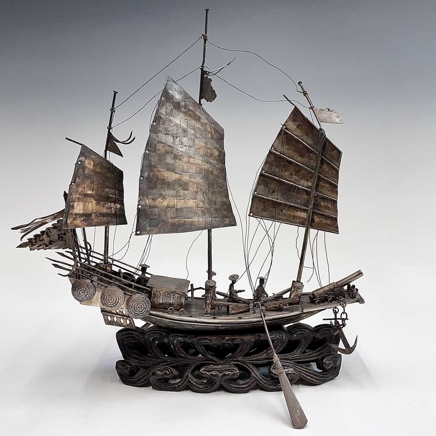 Lot 22 - A Chinese silver model of a junk, early 20th...