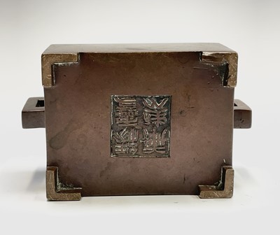 Lot 55 - A Chinese bronze rectangular censer, Qing...