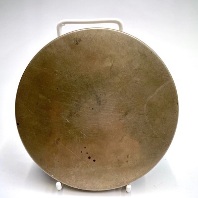 Lot 161 - A Japanese bronze mirror, decorated with...