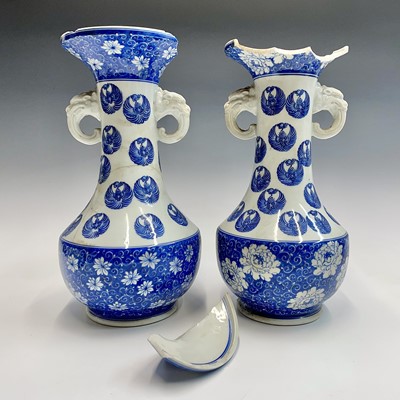 Lot 136 - A pair of Japanese porcelain vases, Meiji...