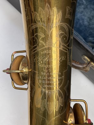 Lot 458 - A gilt lacquered tenor saxophone, by C.G.Conn,...