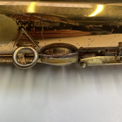 Lot 458 - A gilt lacquered tenor saxophone, by C.G.Conn,...