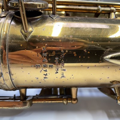 Lot 458 - A gilt lacquered tenor saxophone, by C.G.Conn,...