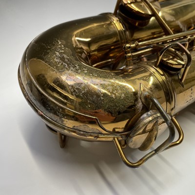 Lot 458 - A gilt lacquered tenor saxophone, by C.G.Conn,...