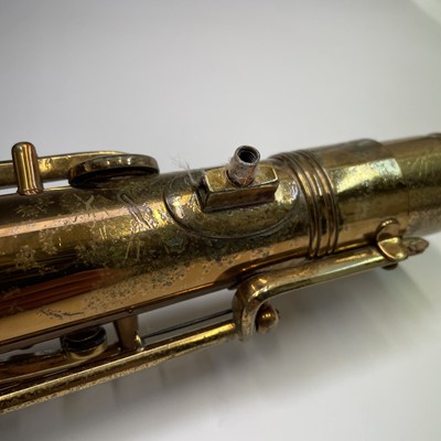 Lot 458 - A gilt lacquered tenor saxophone, by C.G.Conn,...