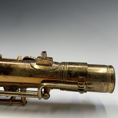 Lot 458 - A gilt lacquered tenor saxophone, by C.G.Conn,...