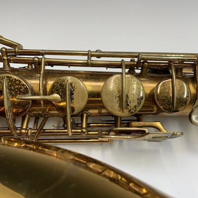 Lot 458 - A gilt lacquered tenor saxophone, by C.G.Conn,...